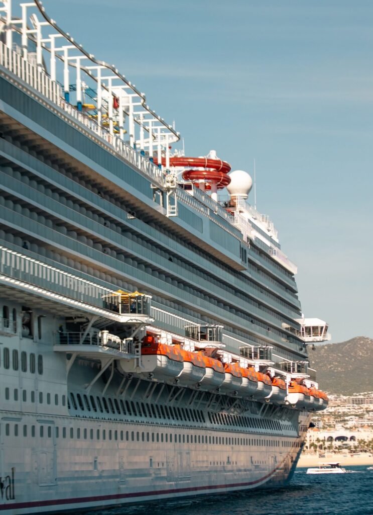 A luxury cruise ship at the port of Cabo San Lucas, Mexico, showcasing travel elegance.