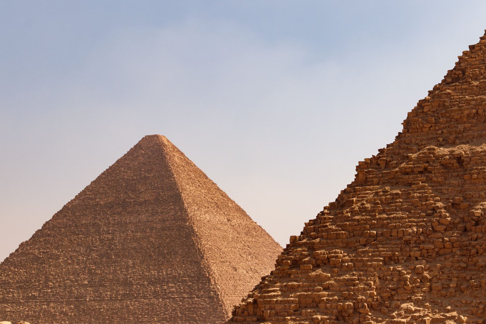 Capture of the iconic Great Pyramids of Giza, showcasing ancient architectural grandeur.