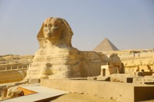 The iconic Great Sphinx and Pyramid of Giza captured on a sunny day.